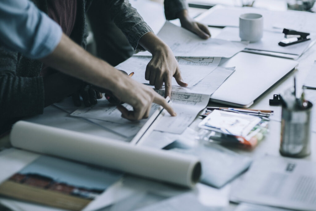 Close up of a coworkers working on a project